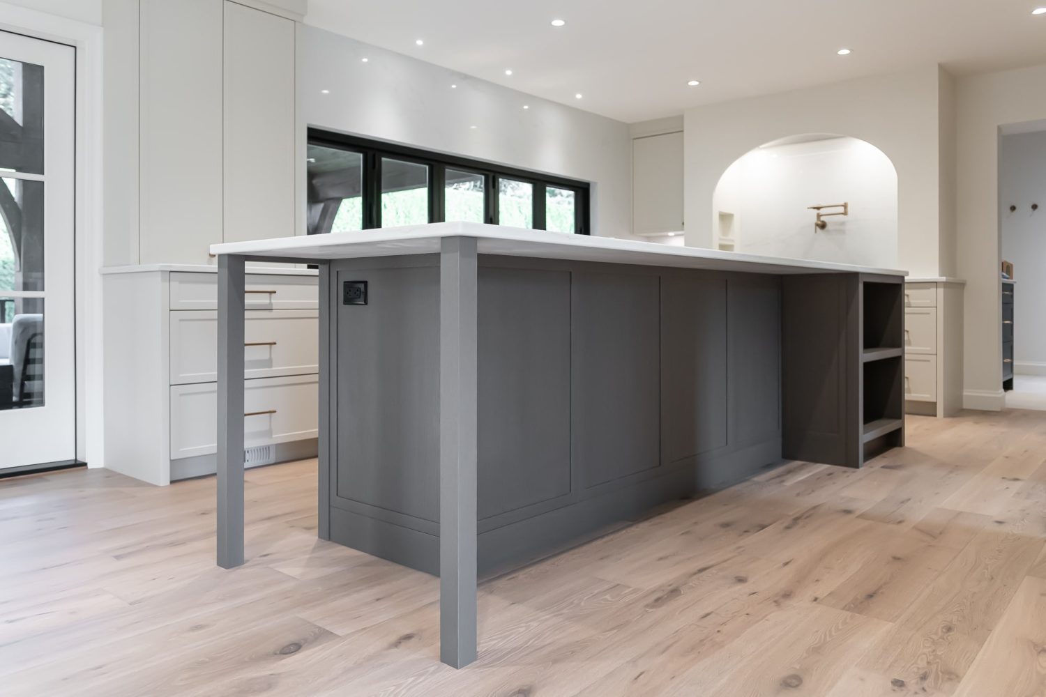 Custom dark charcoal kitchen island by Alderidge's Crowned Sparrow Cabinetry devision